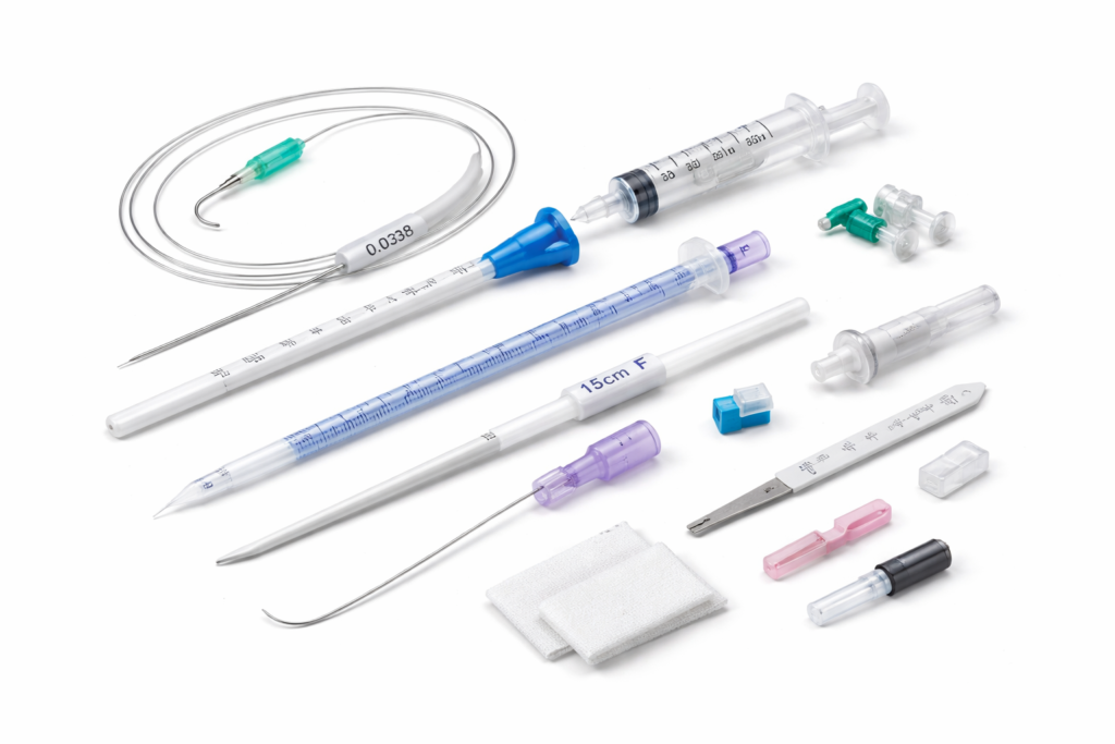 medical introducer kit components arranged neatly
